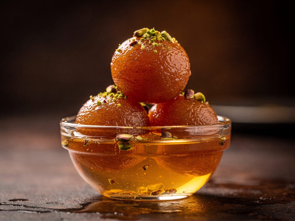 Gulab jamun dessert (illustrative)